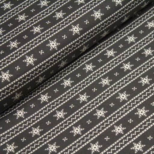Tissu de coton de Noël scandinave aux flocons de neige écrus, fond gris - tissuspipi.com