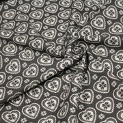 Tissu de coton de Noël scandinave aux cœurs & étoiles de neiges écrus, fond gris - tissuspipi.com
