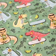 Tissu de coton Dinosaure music lover, fond vert sauge - Oeko - Tex - tissuspipi.com