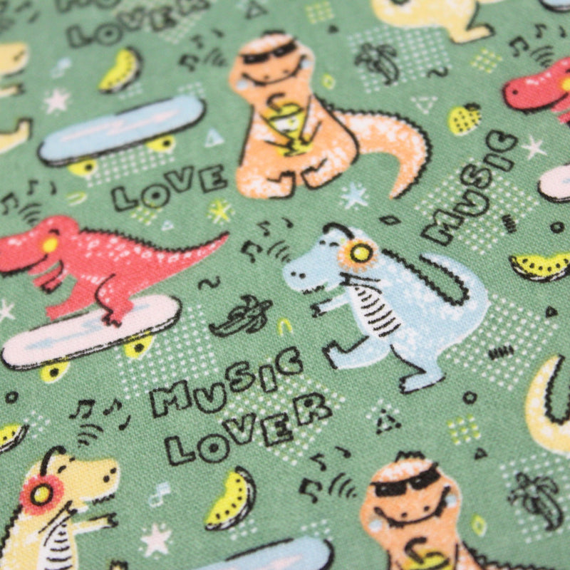 Tissu de coton Dinosaure music lover, fond vert sauge - Oeko - Tex - tissuspipi.com
