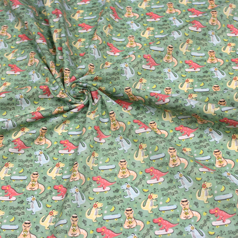 Tissu de coton Dinosaure music lover, fond vert sauge - Oeko - Tex - tissuspipi.com