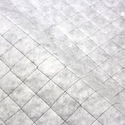Tissu Doublure matelassée noire, ouatine blanche - tissuspipi.com