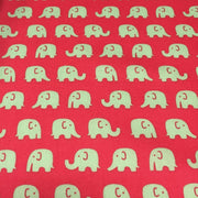 Tissu cotonnade rouge aux éléphants verts - tissuspipi.com
