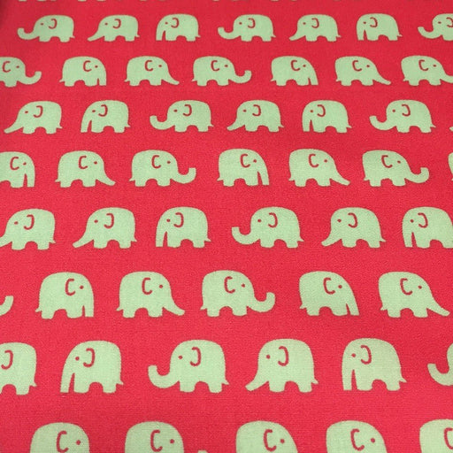 Tissu cotonnade rouge aux éléphants verts - tissuspipi.com
