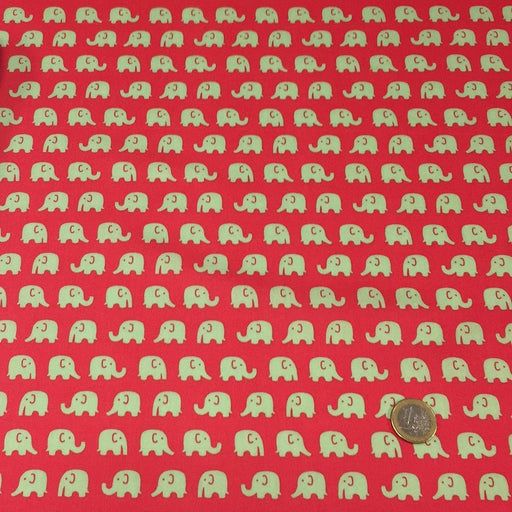 Tissu cotonnade rouge aux éléphants verts - tissuspipi.com