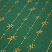 Tissu de coton de Noël aux étoiles & liserés dorés, fond vert - tissuspipi.com