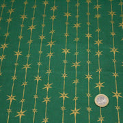 Tissu de coton de Noël aux étoiles & liserés dorés, fond vert - tissuspipi.com